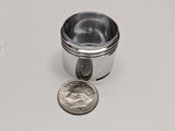 6g charge canister, dime for scale. Shiny! 
